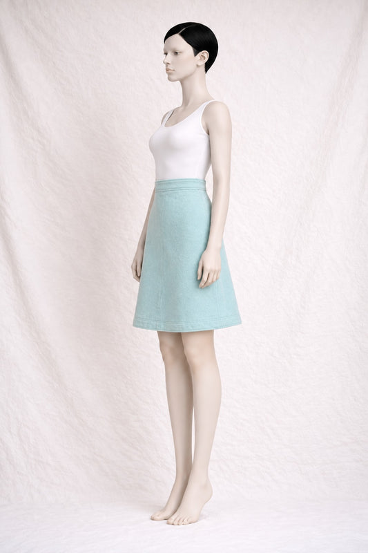 Mini jupe trapèze Courrèges en laine turquoise vintage authentique