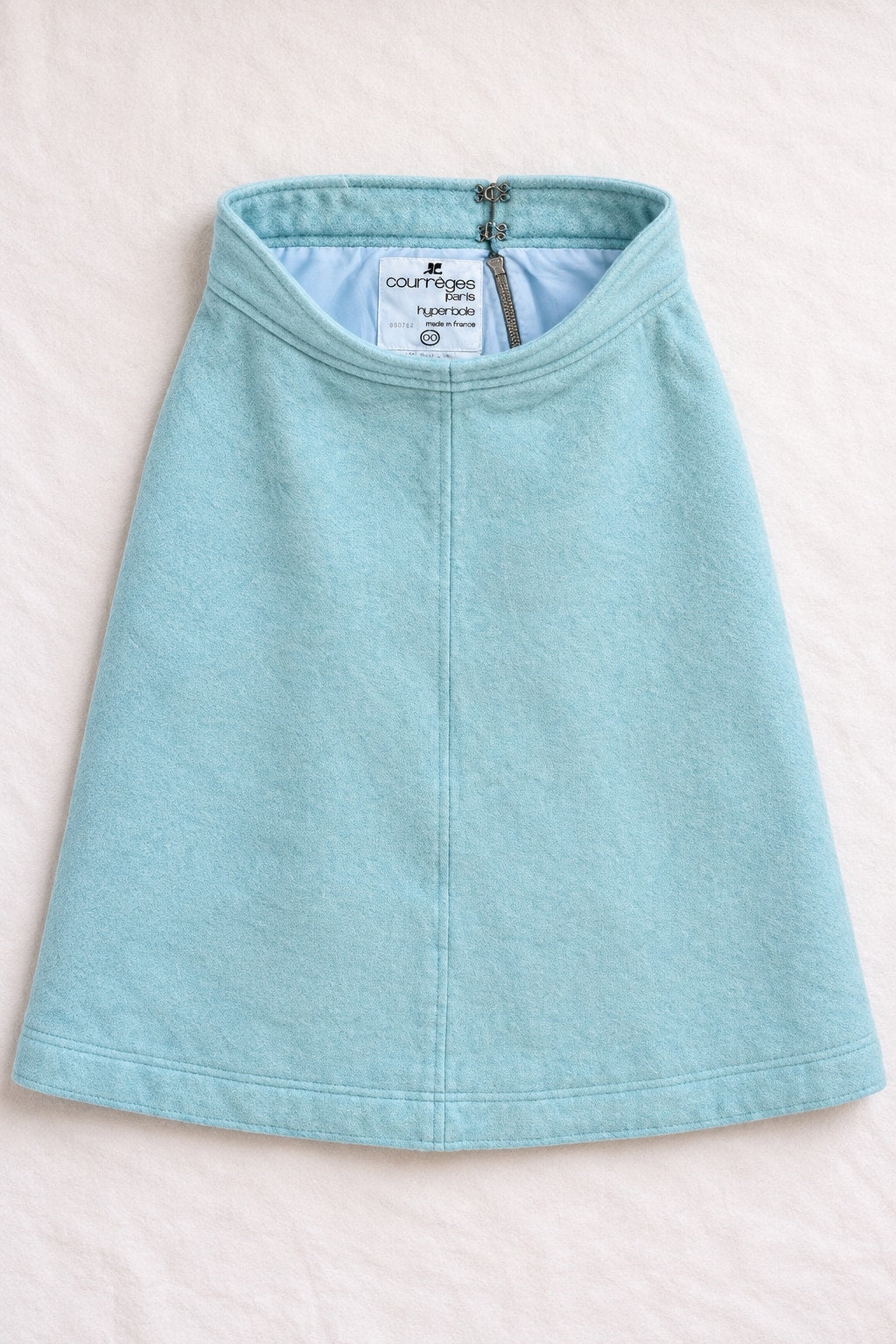 Mini jupe trapèze Courrèges en laine turquoise vintage authentique