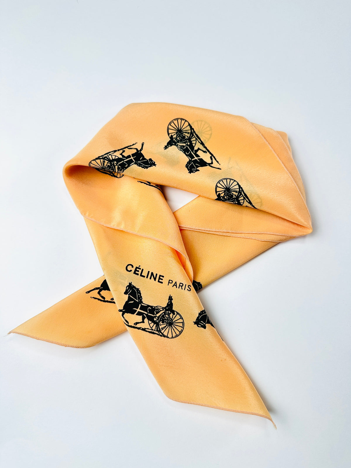 Silk scarf Céline in apricot and black vintage equestrian pattern