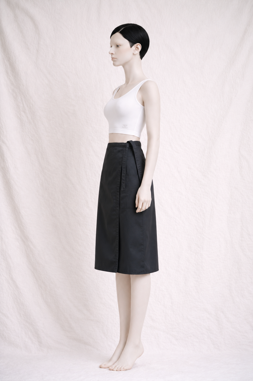 Authentique jupe portefeuille noire Courrèges Paris vintage