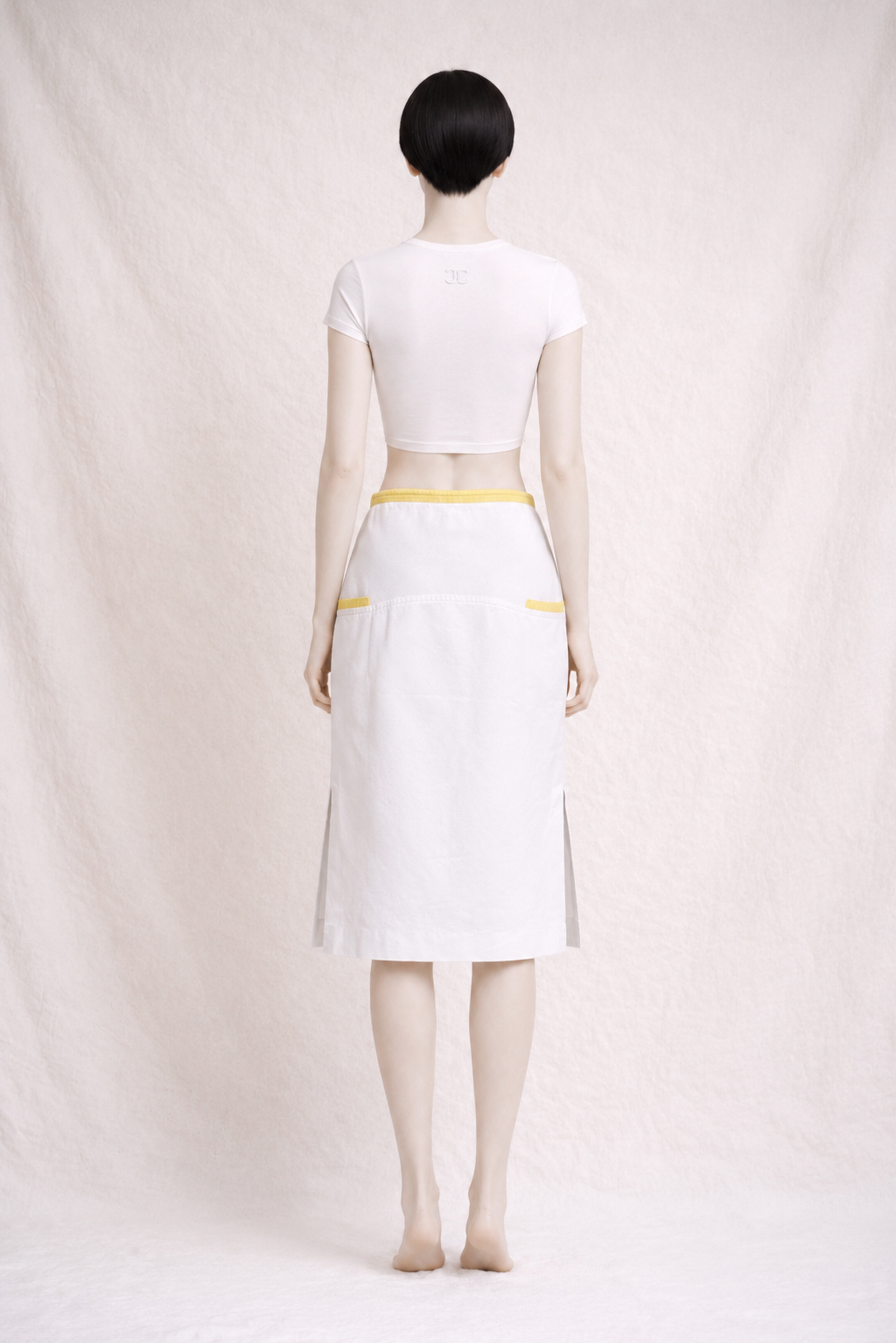 Authentique jupe Courrèges Paris vintage en coton texturé blanc