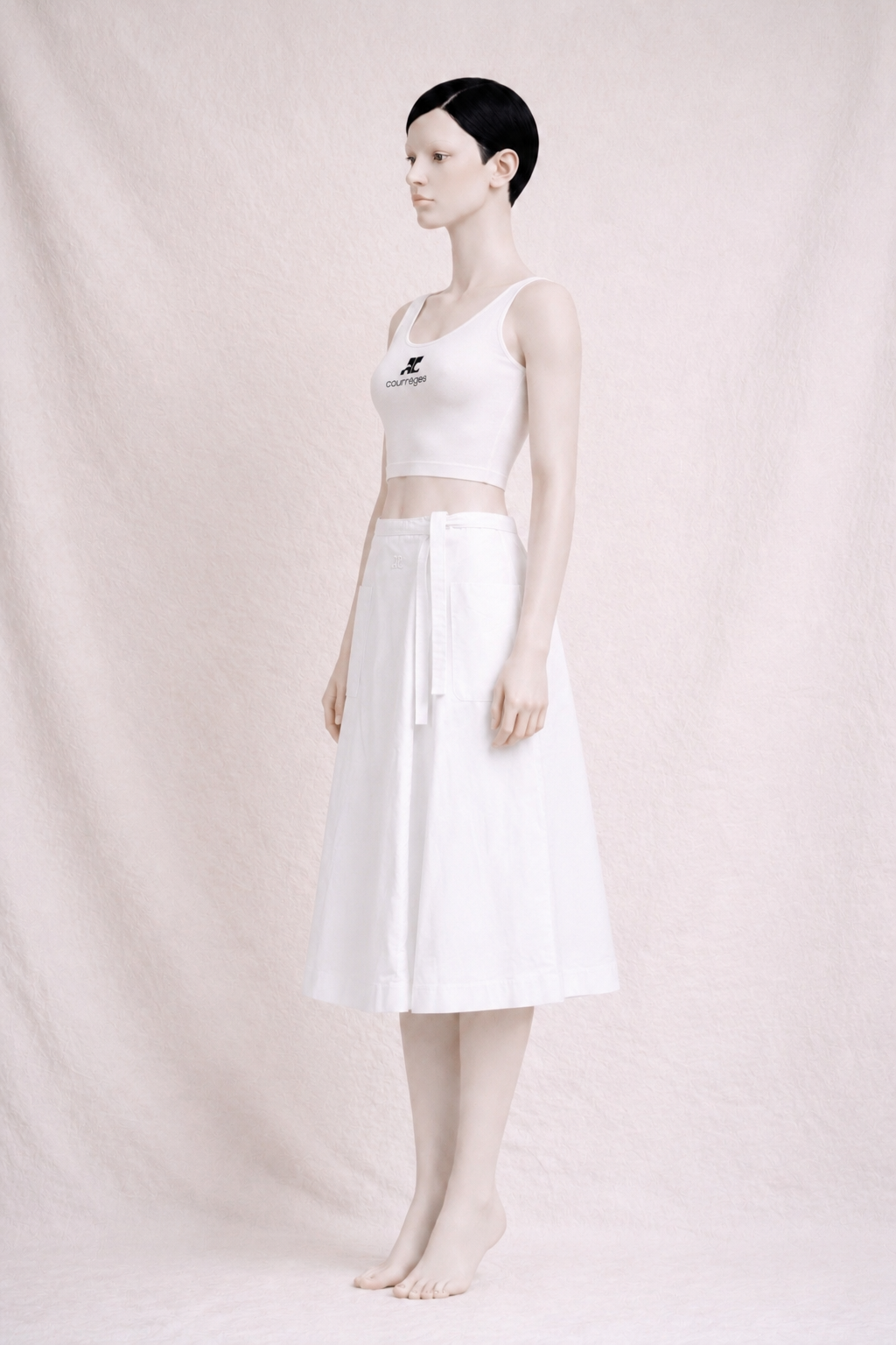 Jupe  - portefeuille blanche Courrèges Paris vintage authentique