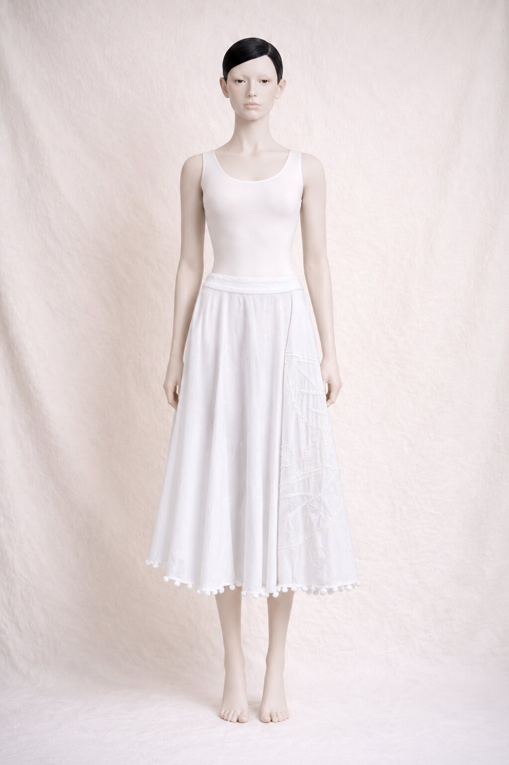 White embroidered midi skirt Tara Jarmon in cotton with pom poms