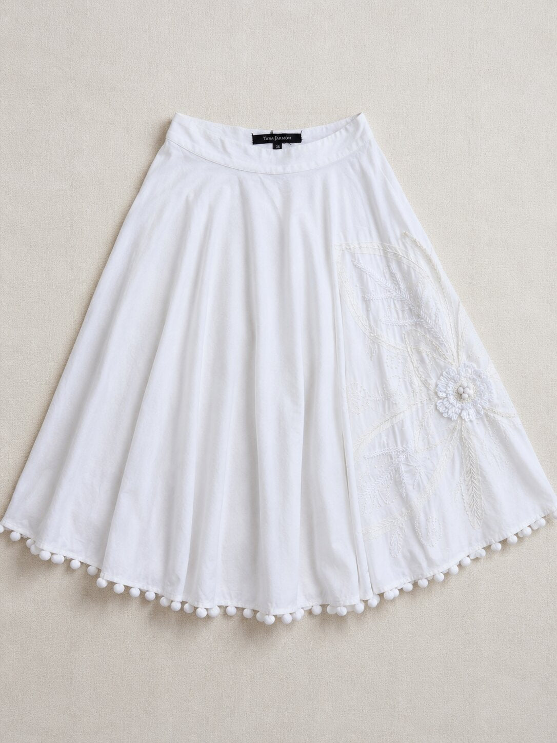 White embroidered midi skirt Tara Jarmon in cotton with pom poms