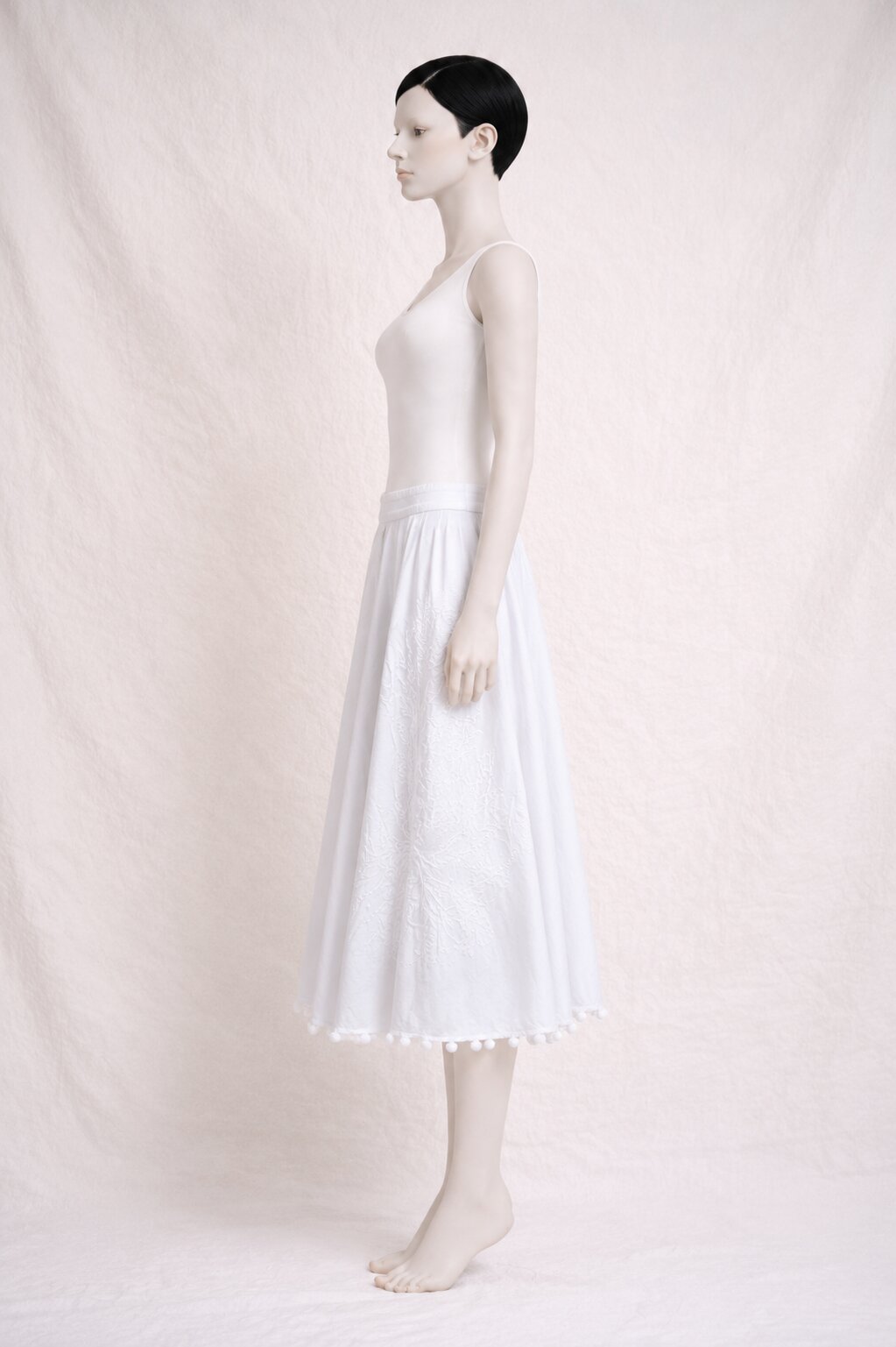 White embroidered midi skirt Tara Jarmon in cotton with pom poms