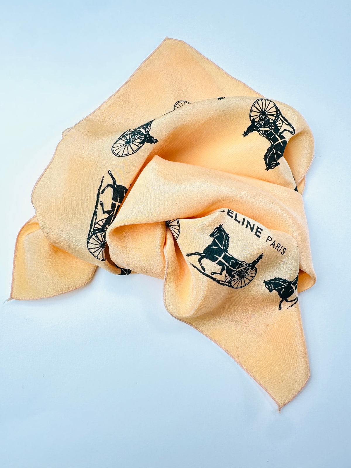 Silk scarf Céline in apricot and black vintage equestrian pattern