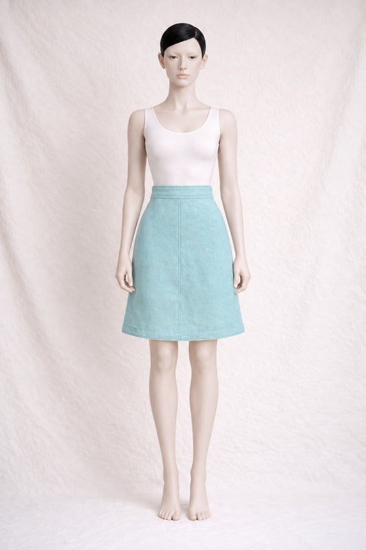 Mini jupe trapèze Courrèges en laine turquoise vintage authentique
