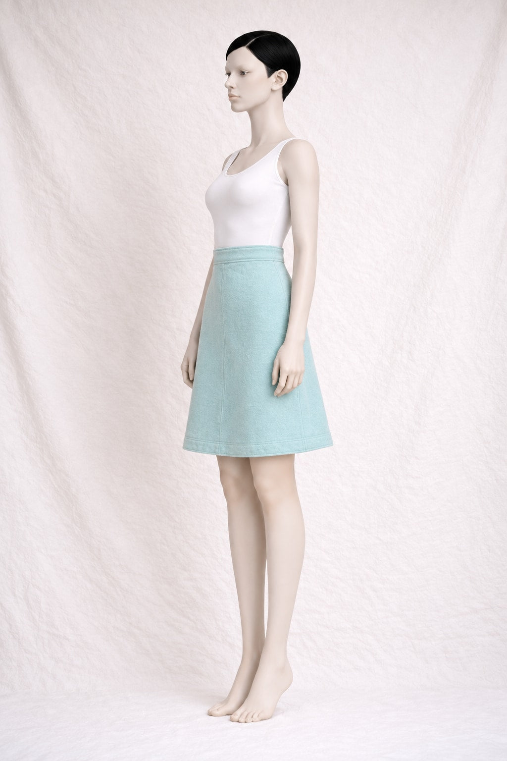 Mini jupe trapèze Courrèges en laine turquoise vintage authentique