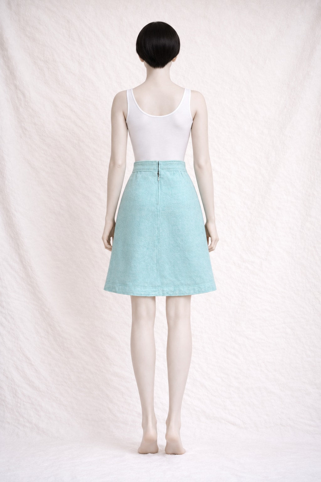 Mini jupe trapèze Courrèges en laine turquoise vintage authentique