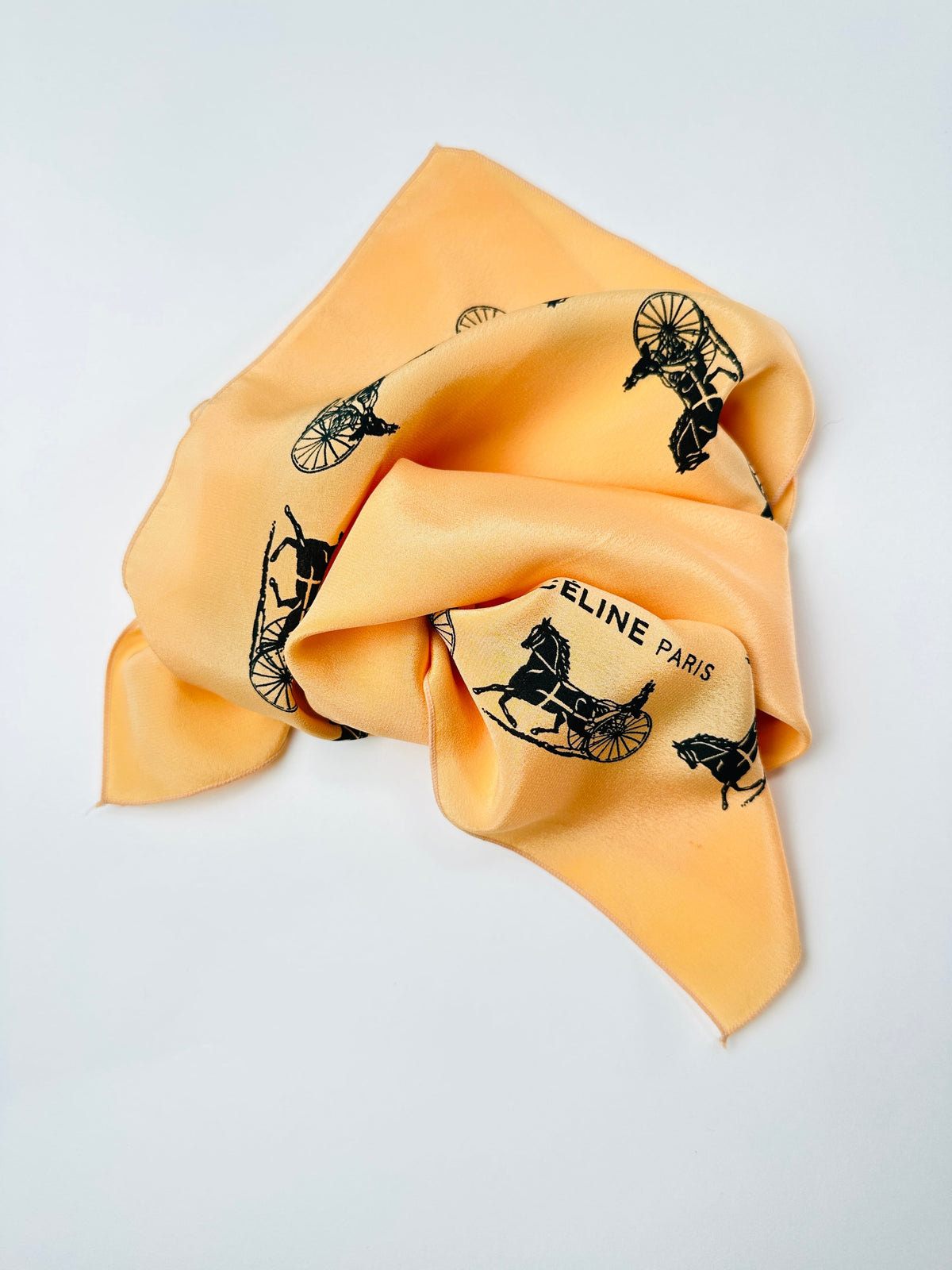 Silk scarf Céline in apricot and black vintage equestrian pattern
