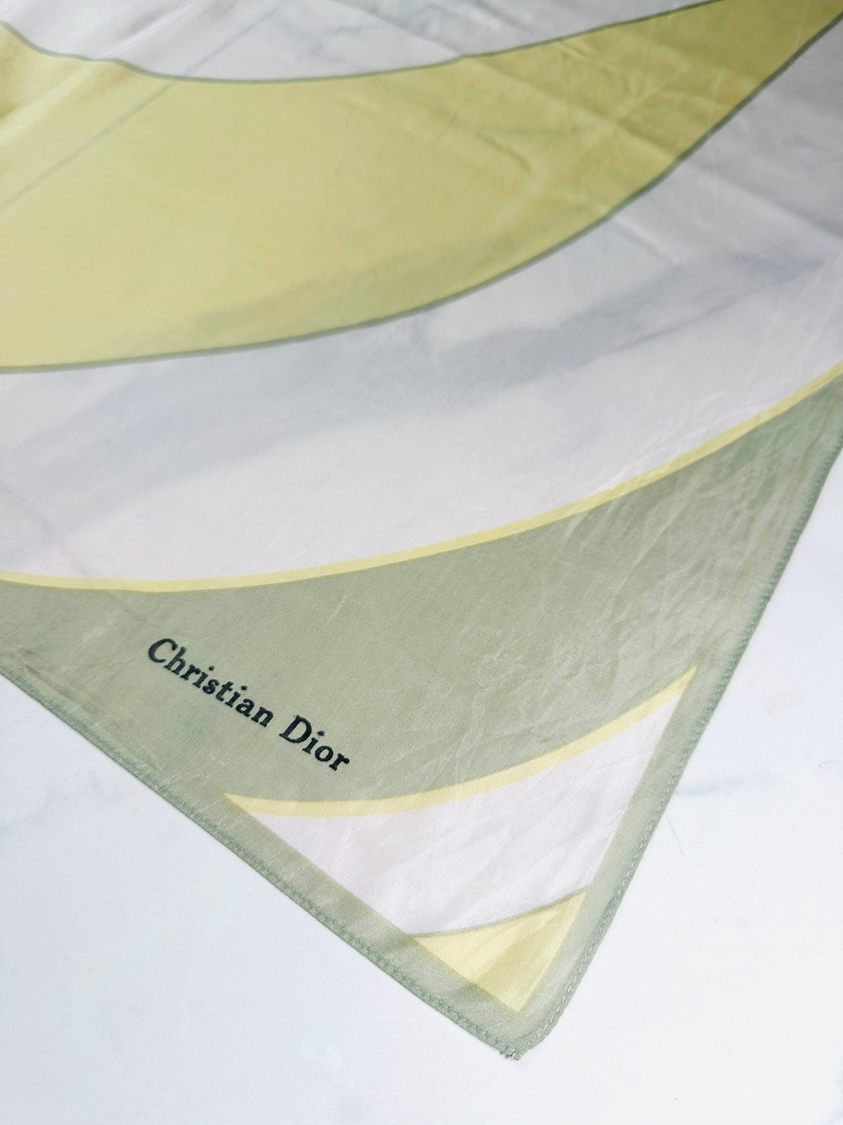 Authentic vintage silk scarf Christian Dior in yellow and green with graphic pattern